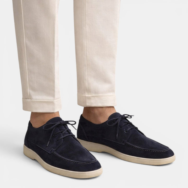 Dark navy men's lace-up loafers. Classic, comfortable summer footwear for everyday and smart-casual men's fashion.