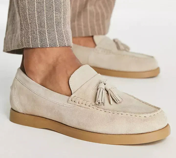 Men's classic beige suede loafers, elegant slip-on style for timeless fashion.