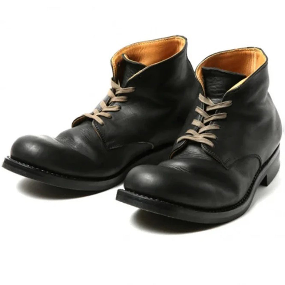 Durable men's classic black boots, ideal for everyday wear. Comfortable & stylish fall/winter footwear.
