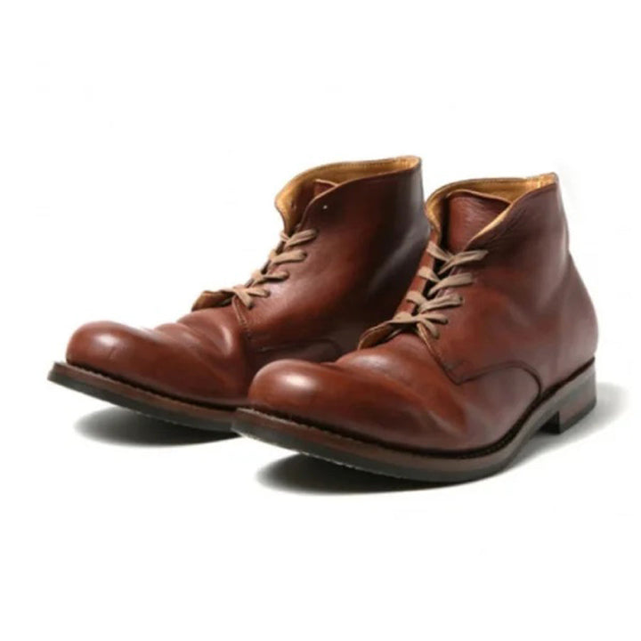 Men's classic everyday boots offering superior comfort & timeless style. Versatile black/brown durable footwear.