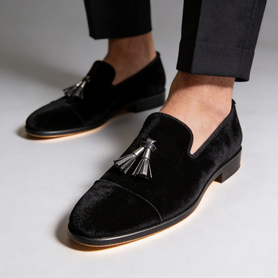 Side view of classic men's tassel loafers, offering elegant style and comfort for formal occasions.