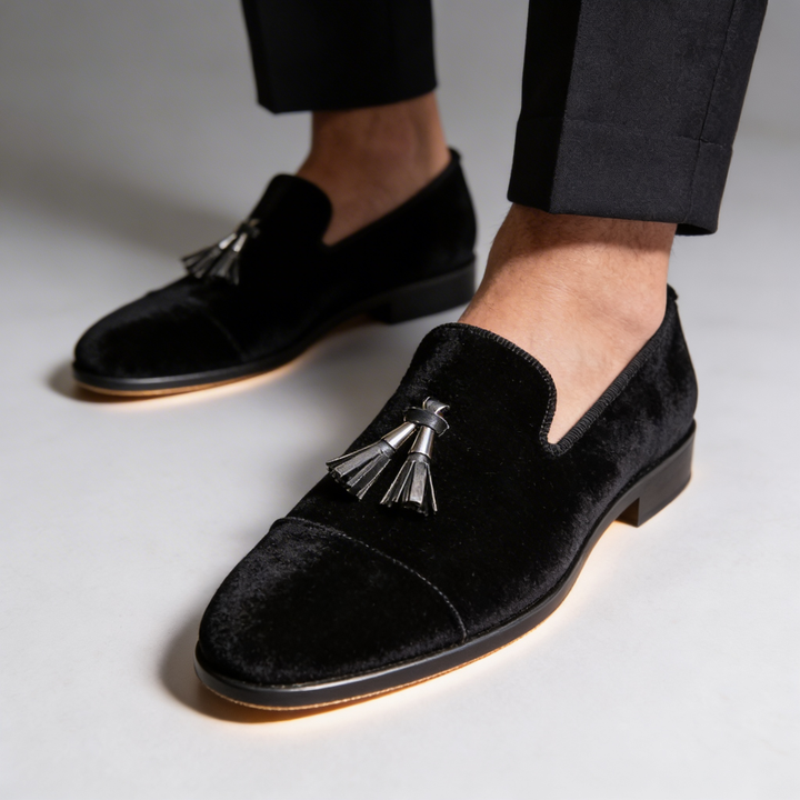 Side view of classic men's tassel loafers, offering elegant style and comfort for formal occasions.