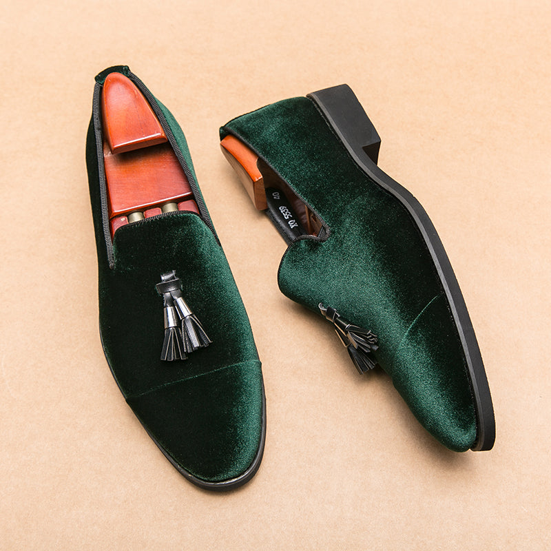 Polished leather men's tassel loafers. Classic, stylish slip-on dress shoes for a refined, sophisticated look.