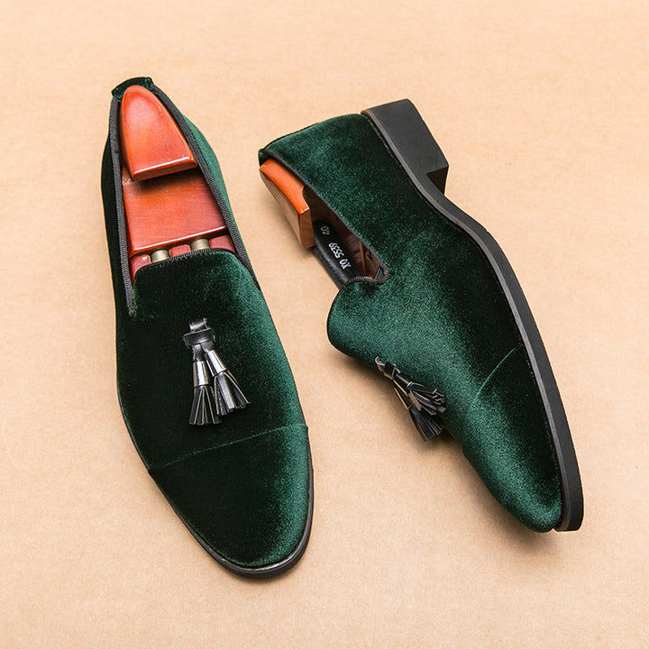 Polished leather men's tassel loafers. Classic, stylish slip-on dress shoes for a refined, sophisticated look.