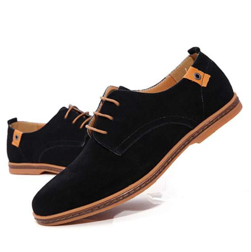 Classic men's lace-up Oxford shoes in polished leather. Stylish formal footwear for business meetings & special events.