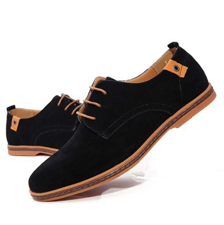 Classic men's lace-up Oxford shoes in polished leather. Stylish formal footwear for business meetings & special events.