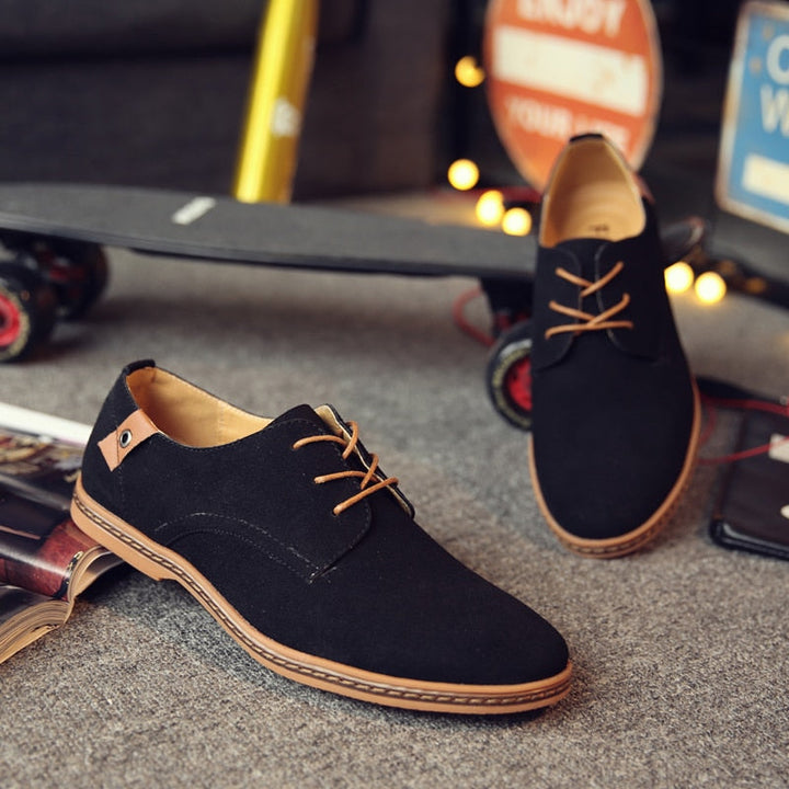 Top-down view of men's Classic Oxford lace-up shoes, showcasing sleek design & smart casual appeal.