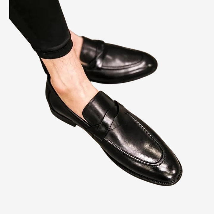 Elegant men's penny loafers, easy slip-on design. Perfect dress shoes for business, formal, or smart casual outfits.