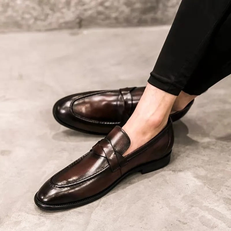 Versatile men's slip-on penny loafers. Comfortable classic dress shoes for work, events, and smart casual occasions.