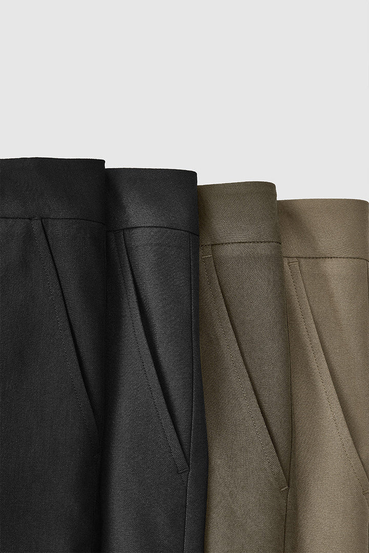 Men's wide leg dress pants paired with dress shoes, highlighting a polished, versatile look for any occasion.