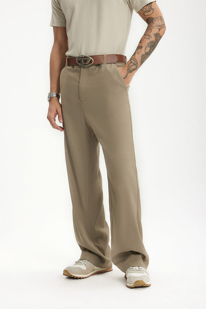 Man in wide leg dress pants, styled formally with a blazer. Perfect for sophisticated formal or business casual wear.