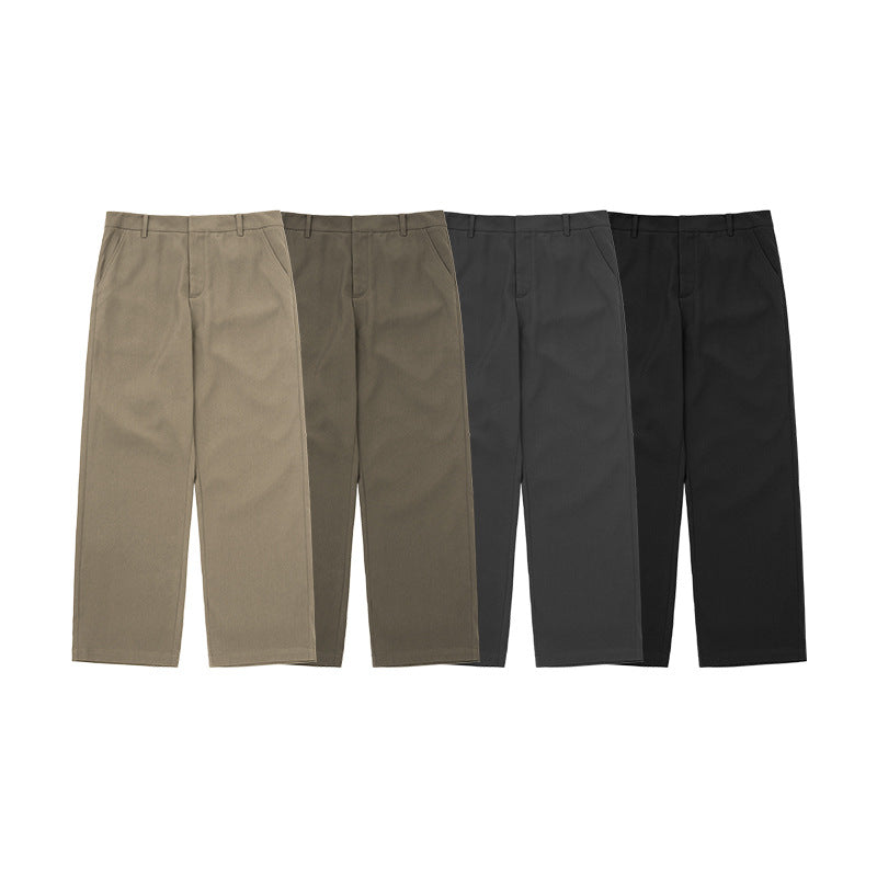 Side view of dark blue men's wide leg dress pants, emphasizing the relaxed fit and elegant drape for versatile style.