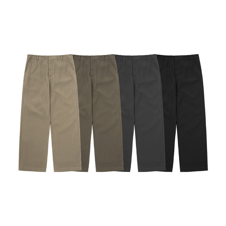 Side view of dark blue men's wide leg dress pants, emphasizing the relaxed fit and elegant drape for versatile style.