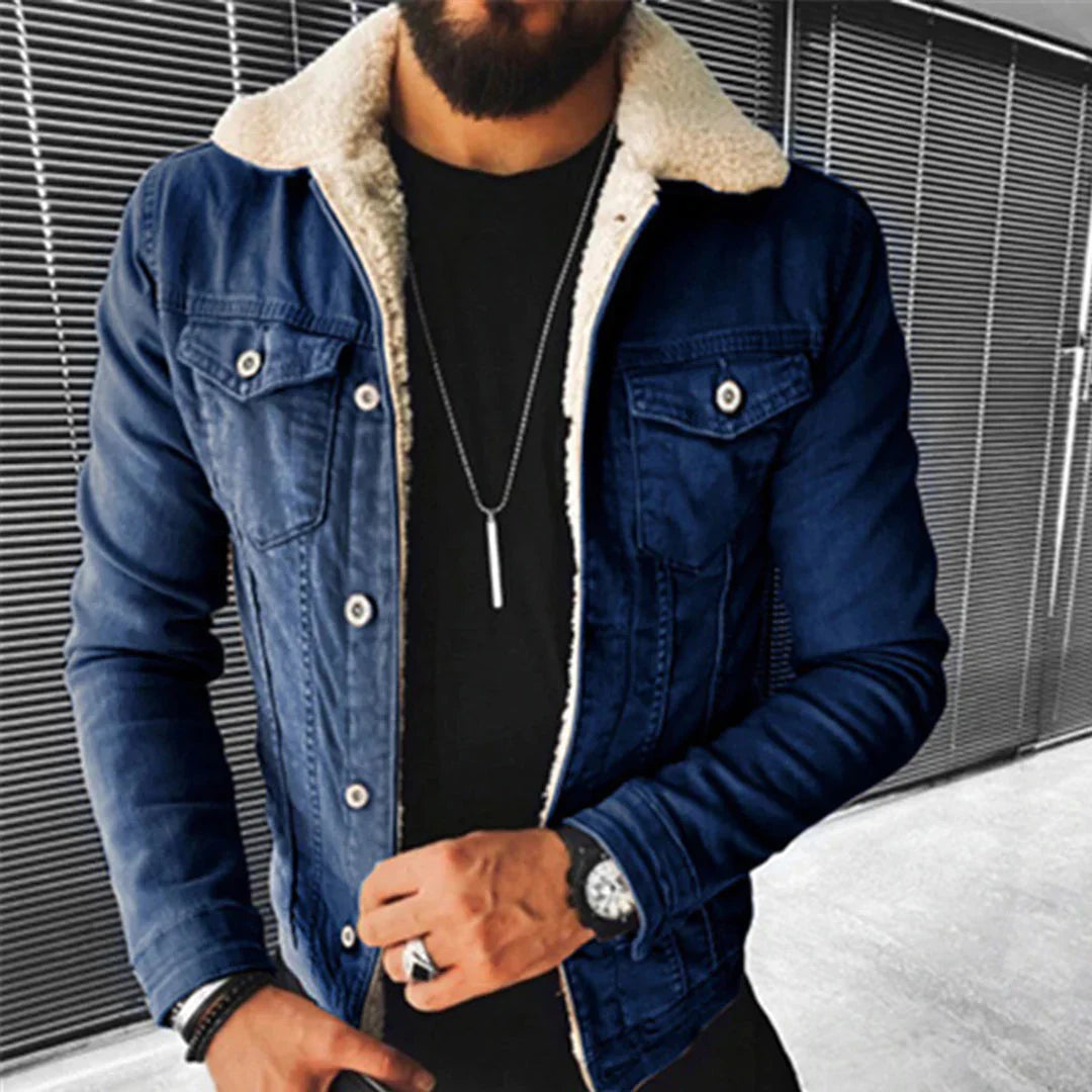 Men's classic blue denim jacket with button front, perfect for timeless urban style & casual layering. Fall/spring outerwear.