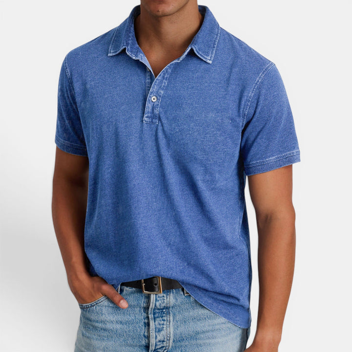 Men's classic blue polo shirt, short sleeve, button collar. Effortless style for smart casual & everyday wear.