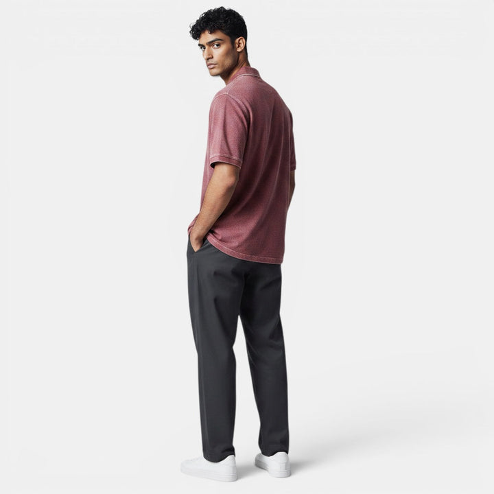 Back view of a men's comfort fit short sleeve polo shirt, classic design. Versatile casual fashion.