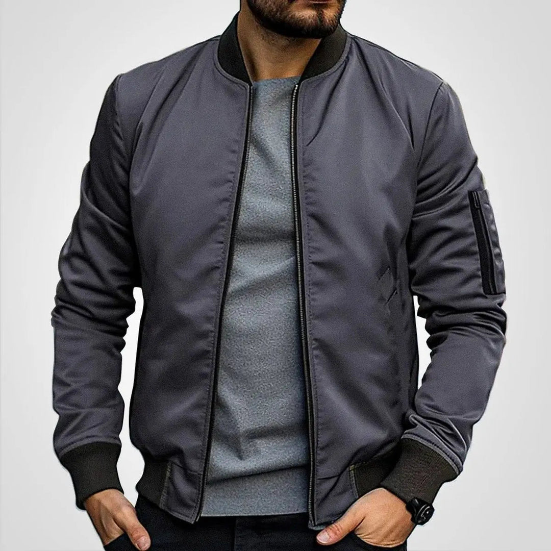 Stylish men's classic bomber jacket. Features zip-up closure & ribbed collar. Perfect casual flight outerwear.