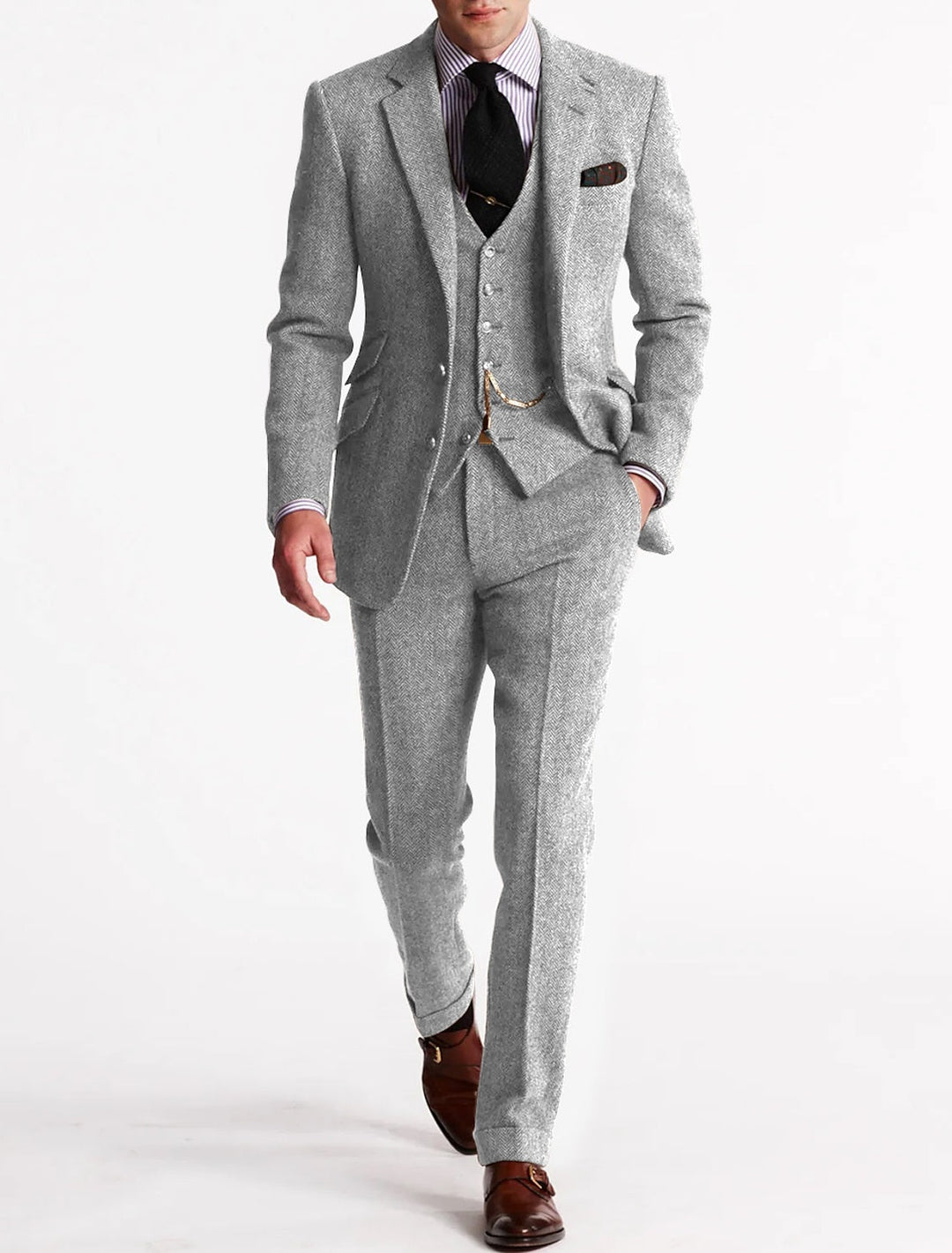 Model wearing a fashionable men's brown herringbone three piece suit for a wedding.