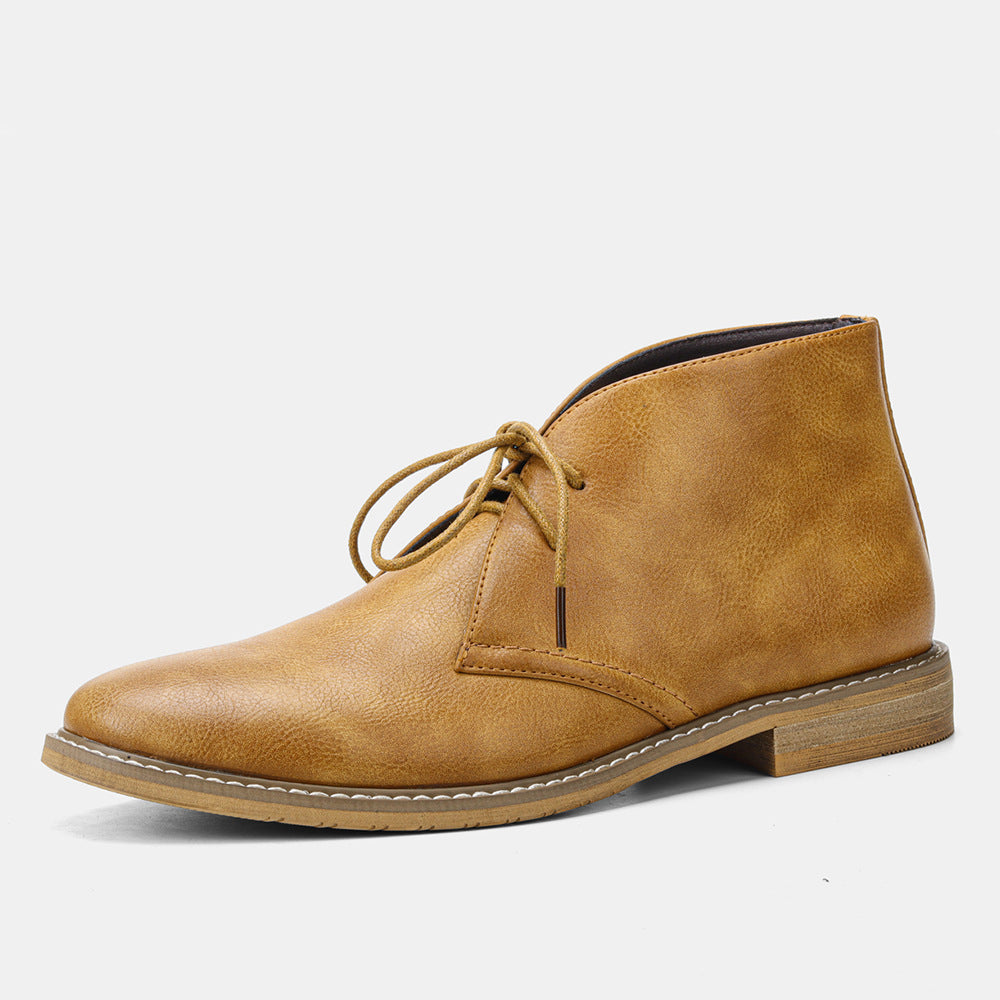 Close-up of durable men's vintage leather boots, showcasing stitching and quality craftsmanship.