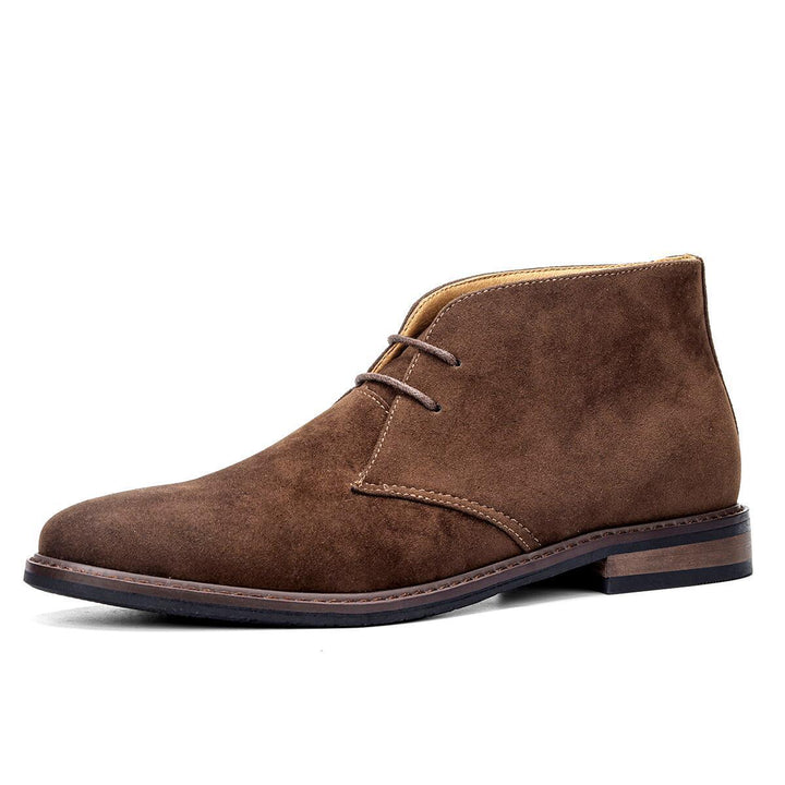 Footwear collection featuring men's stylish leather boots, essential for any wardrobe.