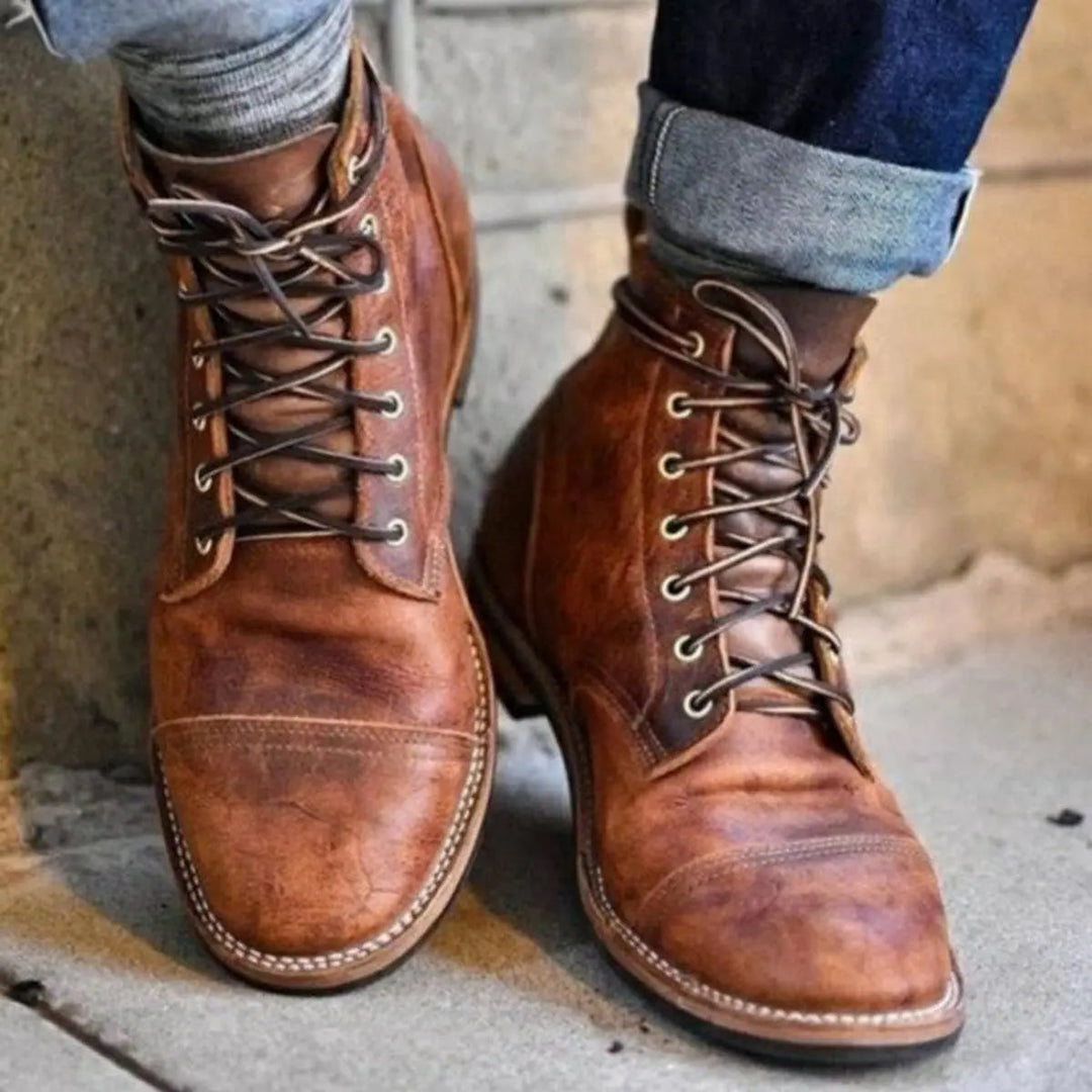 Men's classic brown leather lace-up cap-toe ankle boots for versatile smart-casual everyday wear.