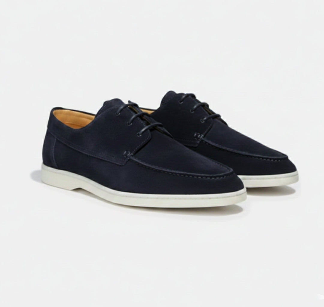 Men's classic brown leather loafers, perfect for timeless style and versatile everyday wear.