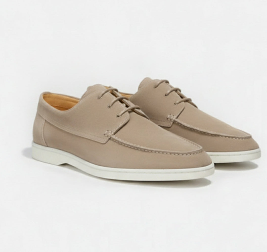 Side view of stylish men's loafers, showcasing classic design and quality craftsmanship.
