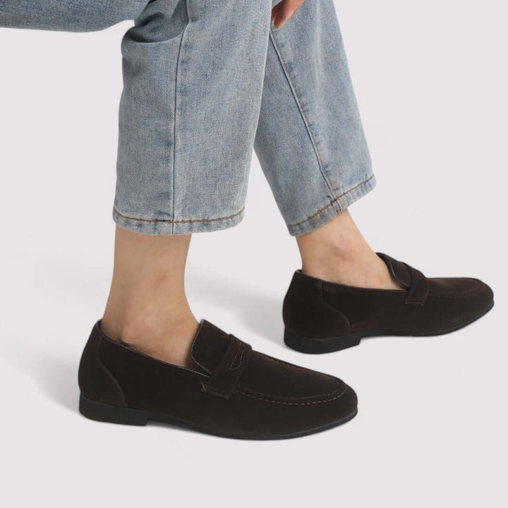 Versatile men's black penny loafers. Comfortable classic footwear for smart casual outfits & everyday style.