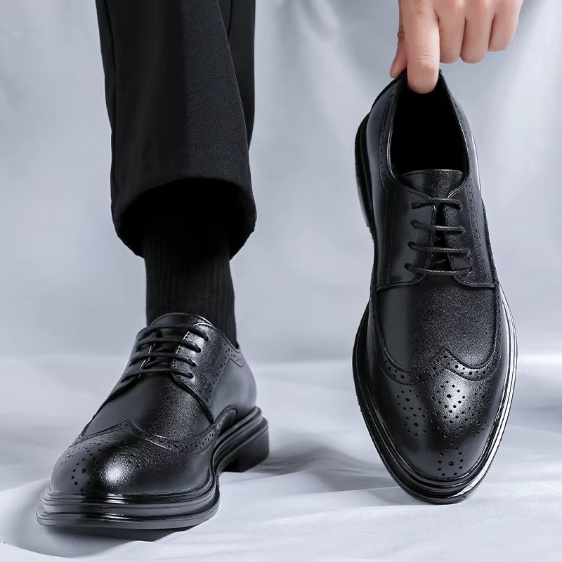 Stylish men's black wingtip brogue Derby shoes with lace-up design, essential for business wear.