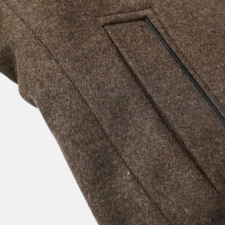 Durable men's navy blue mid-length overcoat, a sleek fall/winter jacket with a refined stand collar.
