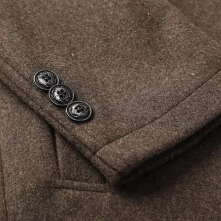 Refined men's gray mid-length overcoat, providing a polished look for professional and casual settings.