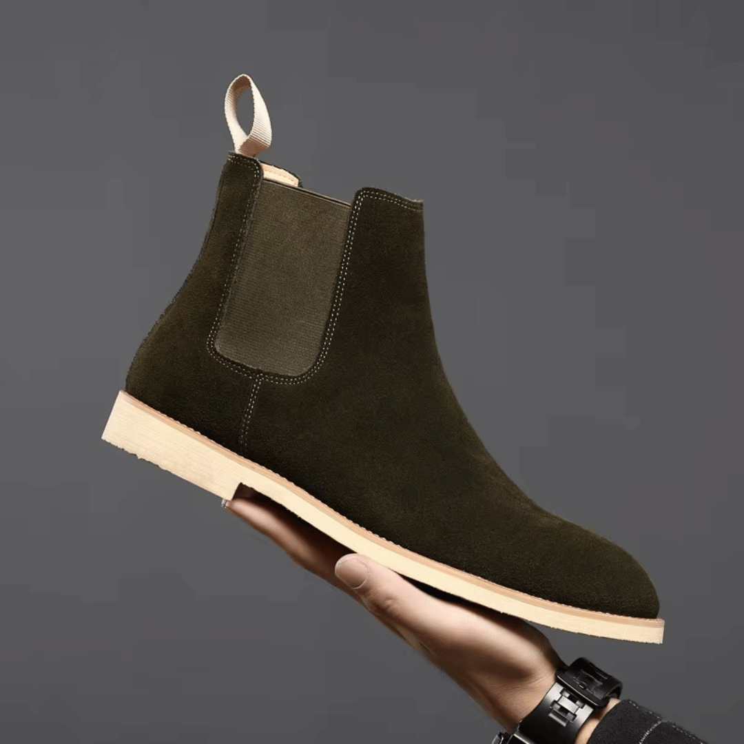 Men's black suede Chelsea boots, versatile footwear for casual and formal occasions.