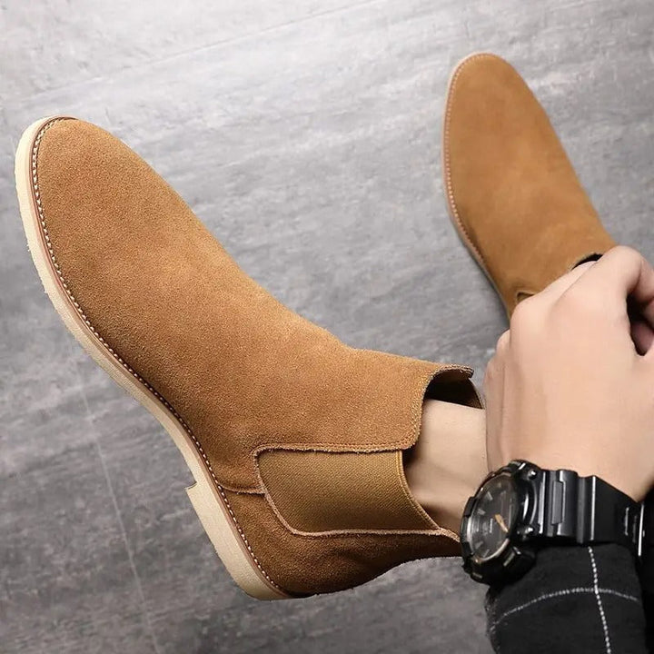 Men's fashion footwear: elegant suede Chelsea boots for a sophisticated look.
