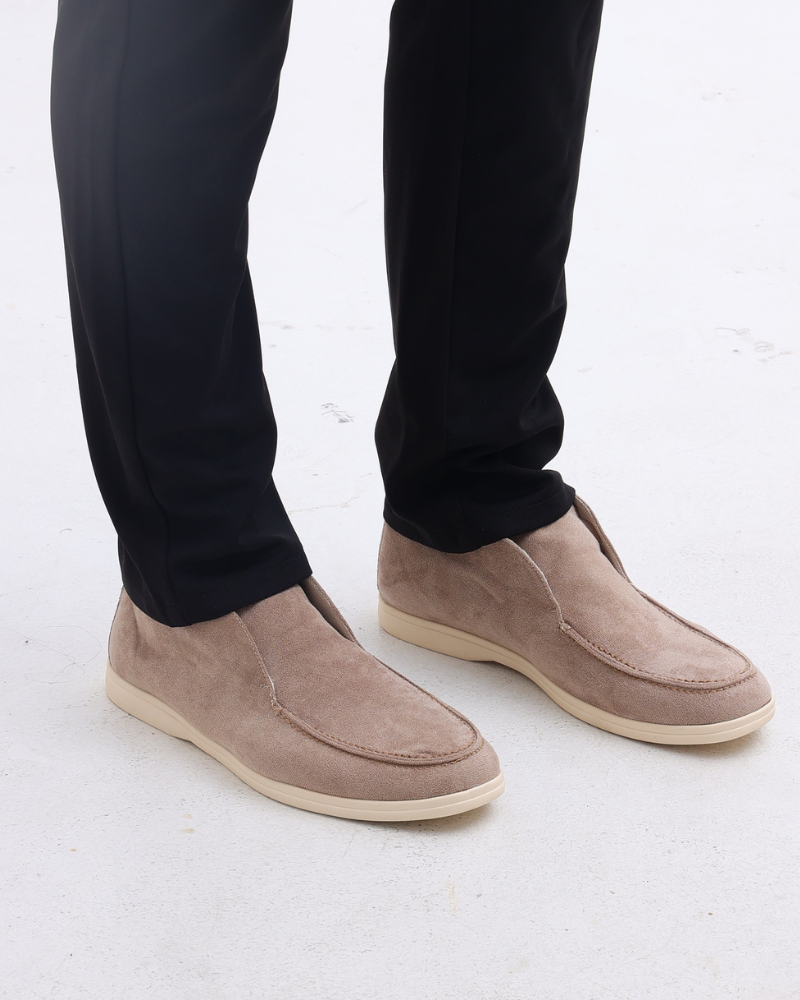 A pair of men's suede loafers in a deep burgundy, ideal for smart casual outfits.