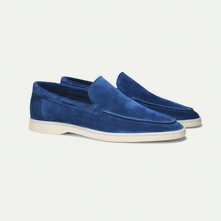 Pair of men's classic suede loafers in beige, ideal for smart casual and formal events