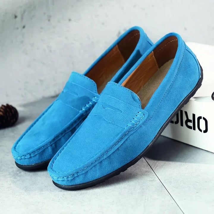 High-quality men's forest green suede loafers, a stylish choice for smart casual events.