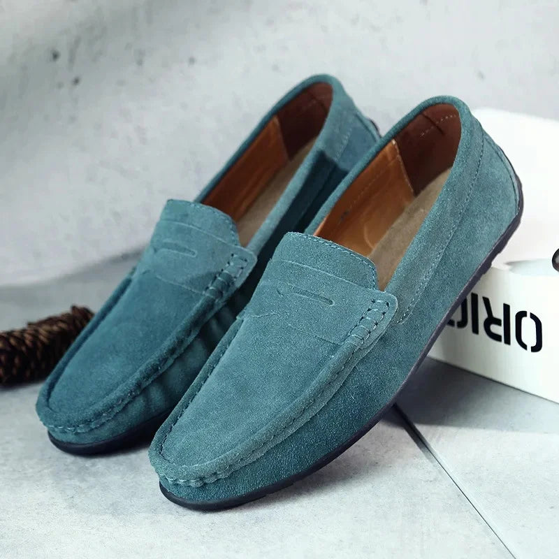 Men's comfortable slip-on suede loafers in a deep espresso shade with penny strap.