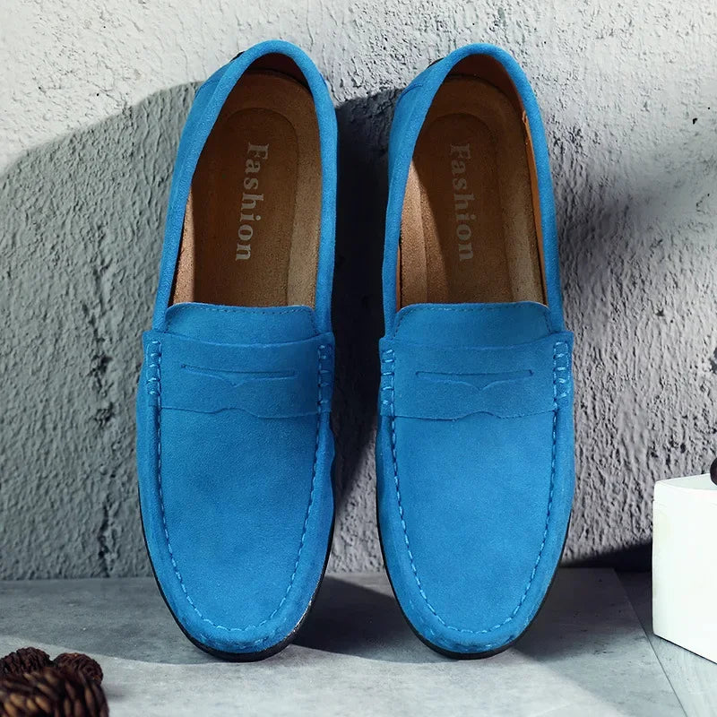 Durable and comfortable men's suede penny loafers in a versatile charcoal color.
