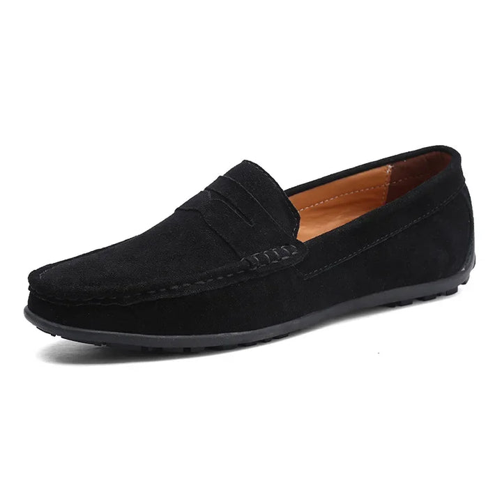Men's elegant black suede loafers with a classic penny strap, ideal for smart occasions.