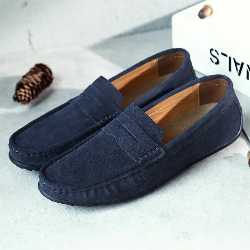 Men's desert sand suede loafers with a subtle penny strap, great for summer wear.