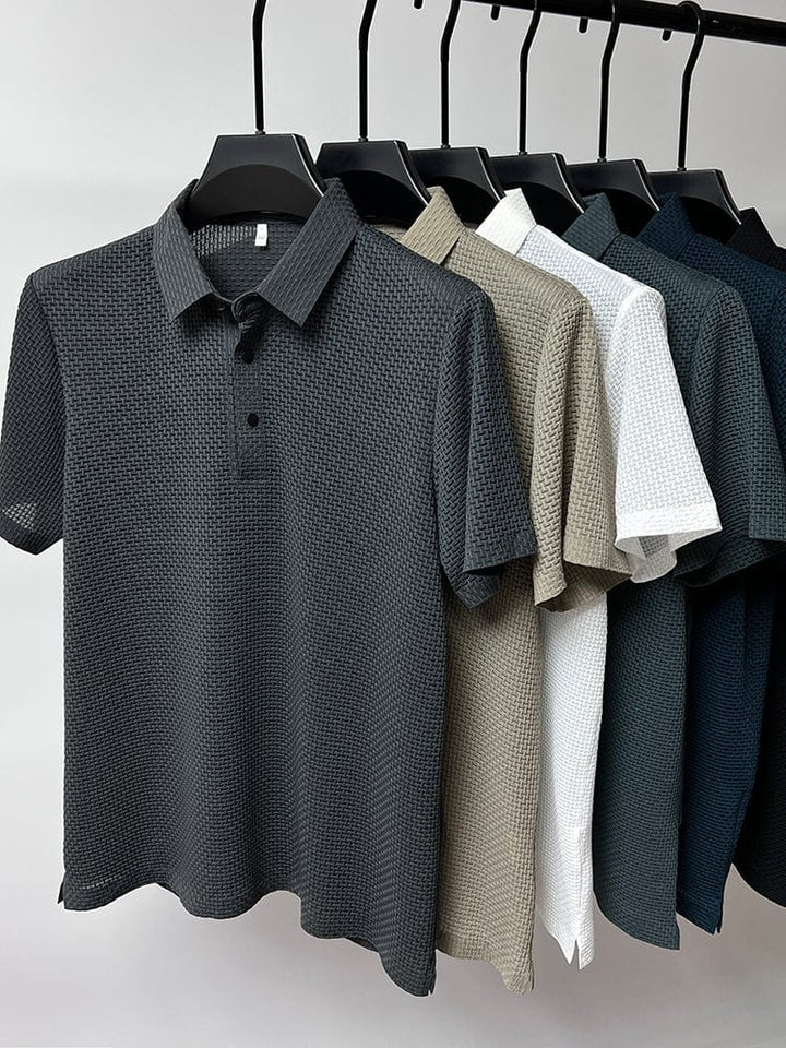 High-quality men's classic button-up polo. Soft fabric, short sleeves, offering effortless style & comfort.