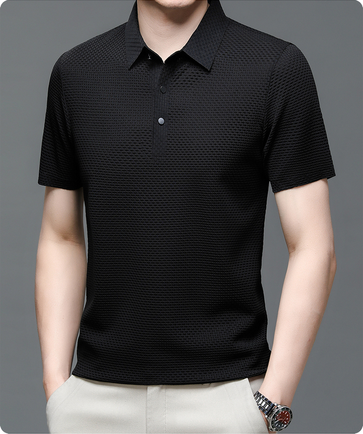 Man wearing a classic men's button-up polo shirt. Comfortable short sleeve top for stylish casual outfits.