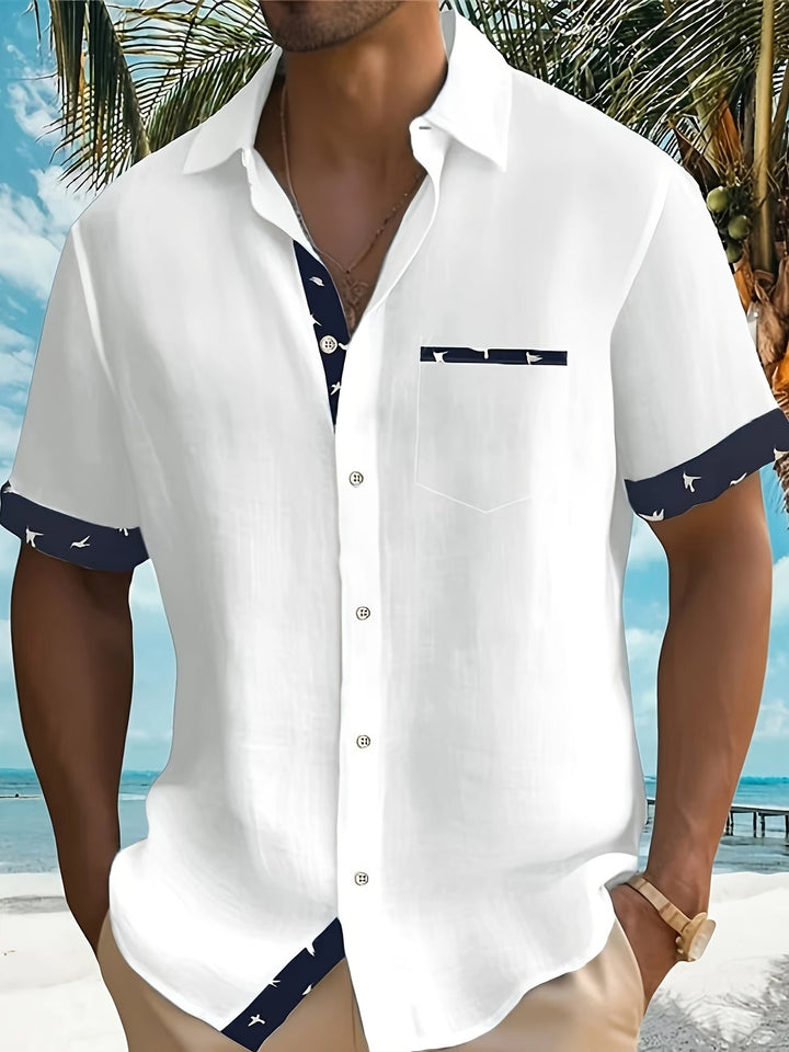 Lightweight men's casual short-sleeve button-up shirt in a breathable fabric. Ideal for summer and easy care.
