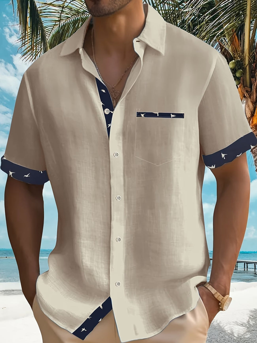 Stylish men's lightweight summer button-up shirt with short sleeves, perfect for vacation or casual warm weather.
