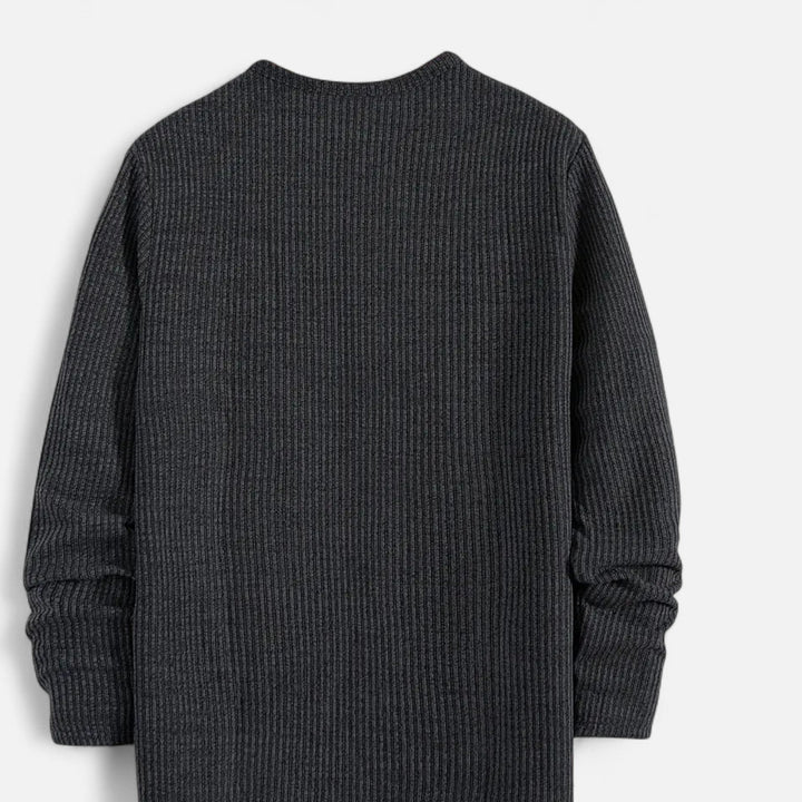 Men's cable-knit henley sweater styled casually. A sophisticated regular fit pullover for spring & autumn fashion.