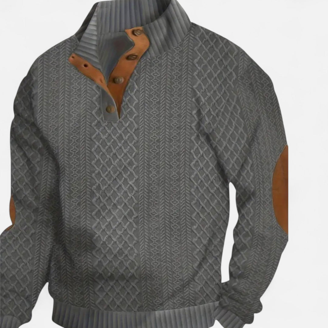 Model wearing a men's classic cable knit sweater with a modern stand collar.
