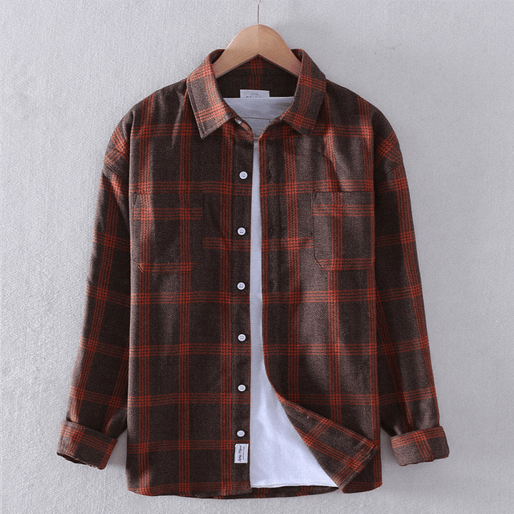 Timeless men's checkered shirt with a button-down design, long sleeves, and a comfortable relaxed fit for versatile wear.