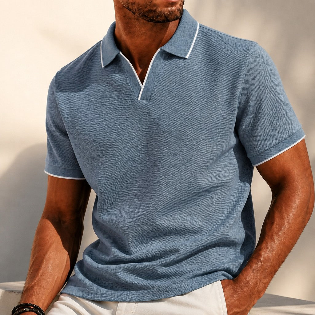 Soft knit men's polo shirt with classic collar. Breathable & comfortable for summer and everyday style.