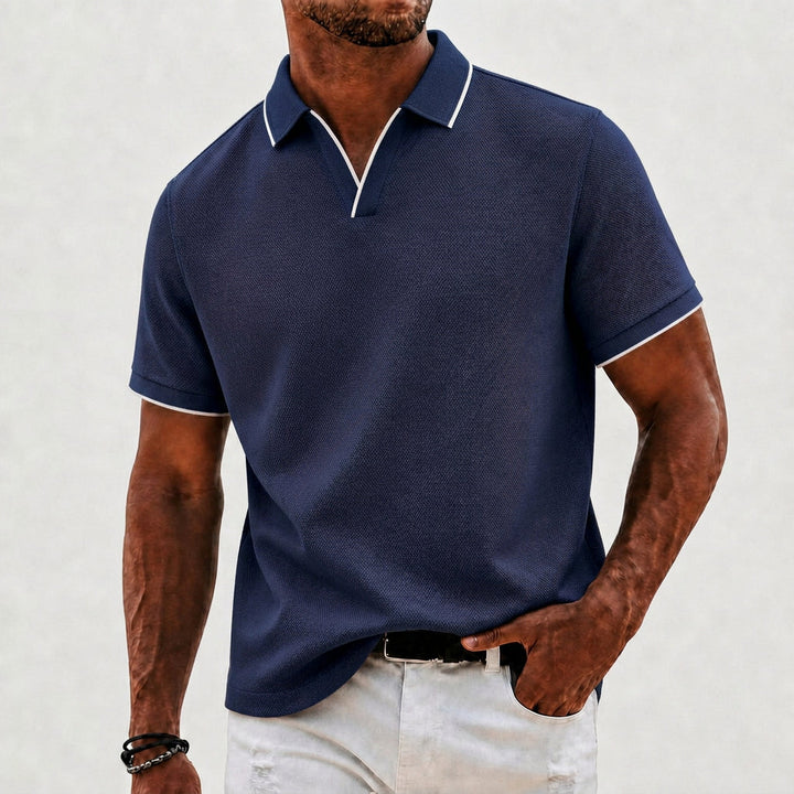 Premium men's knit polo shirt, classic collar design. Effortless style for modern menswear.