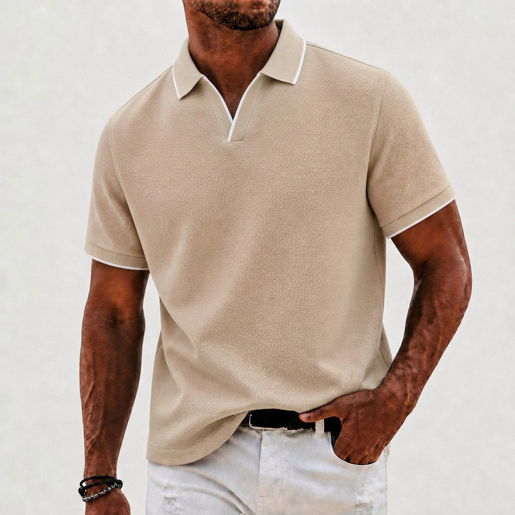 Effortlessly stylish men's knit polo shirt, classic collar. Offers a comfortable fit for casual wear.
